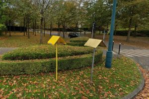 mysterious roadside markers topped with triangles